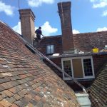 Re-tiling large Victorian wing of C16 cloth hall
